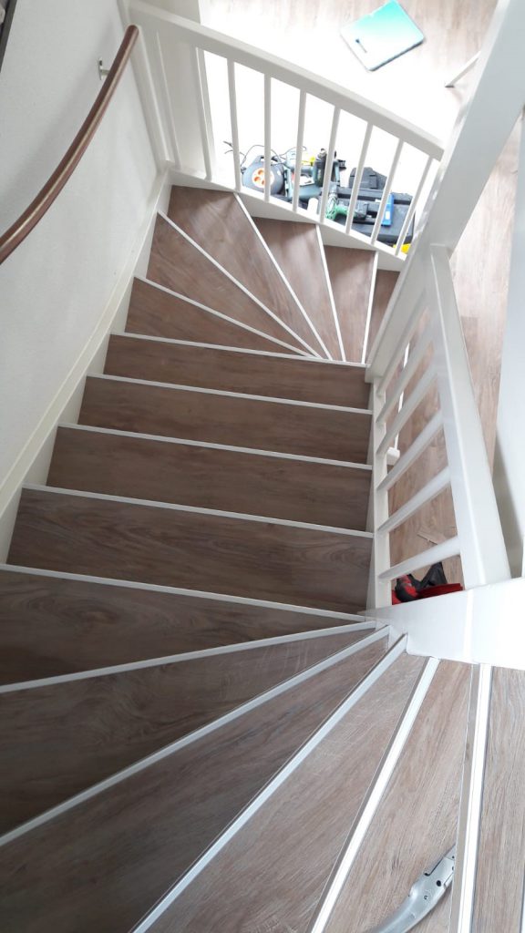 Dichte trap voorzien van PVC stroken - Schoonebeek